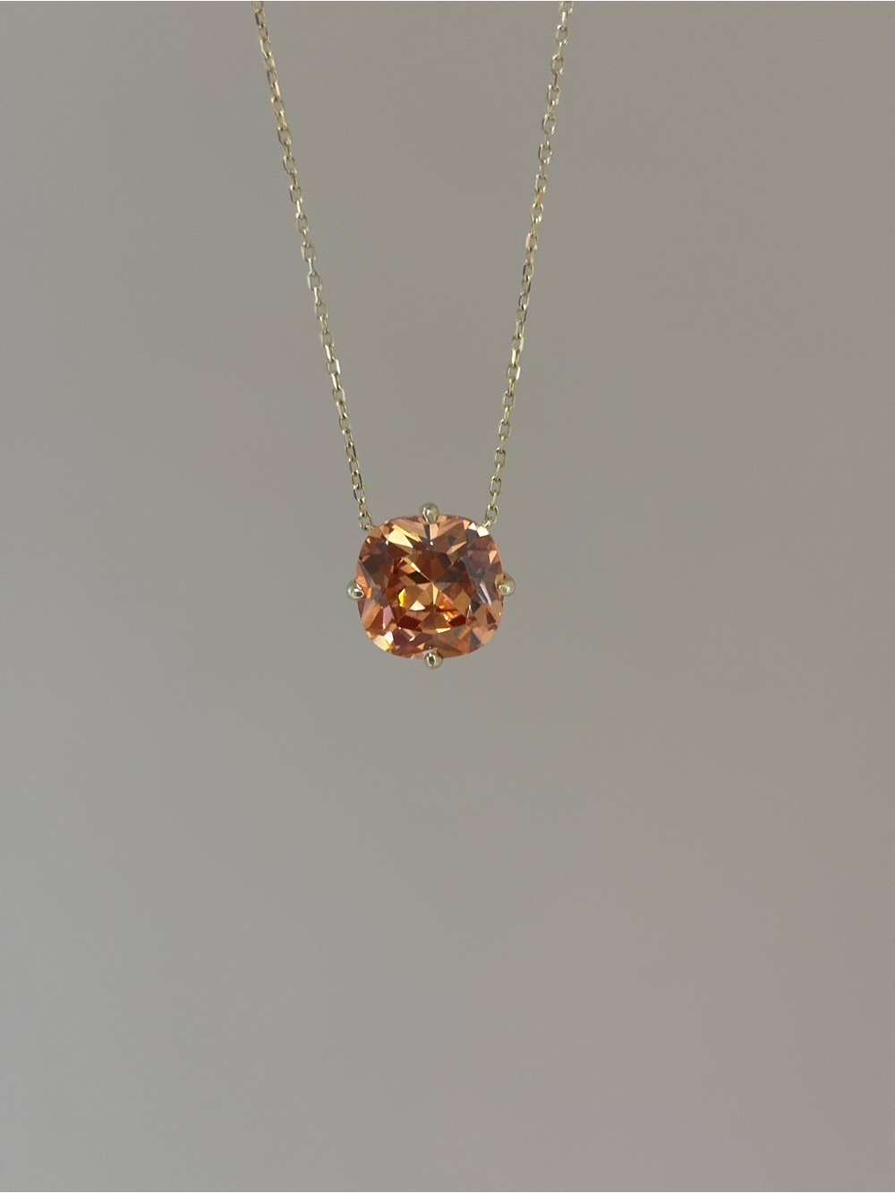 Elegant Gold Necklace with Peach-Coral Solitaire Pendant